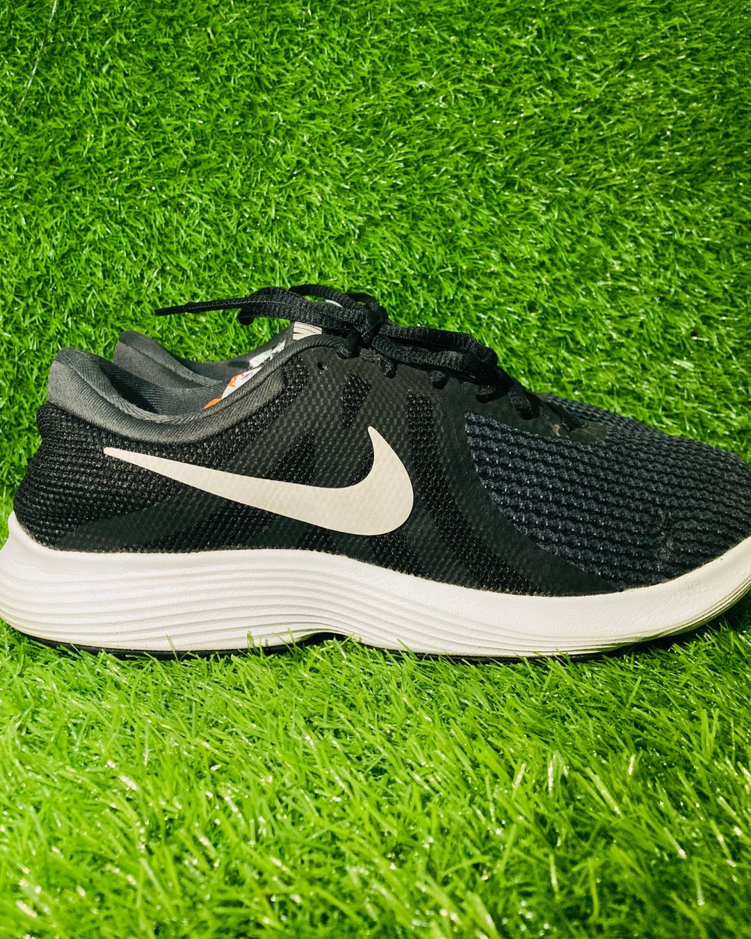 Nike Revolution 4 Lightweight Running Shoes (Black / Off-White) — view 1